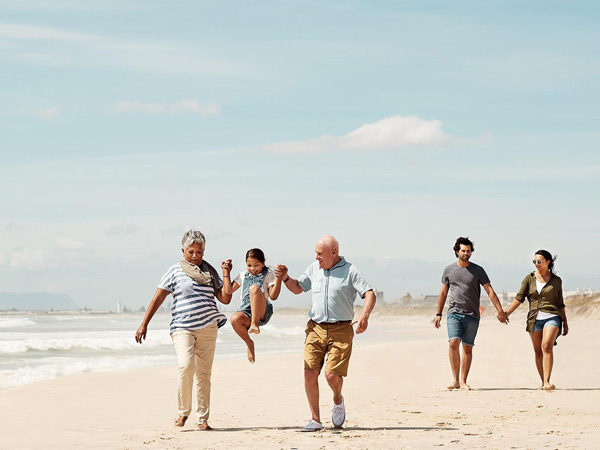 Family playing at the beach