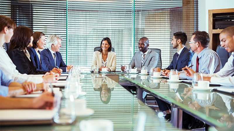 a group of professionals meeting in a conference room