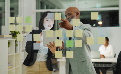 Two portfolio managers plan a globally diversified investment portfolio