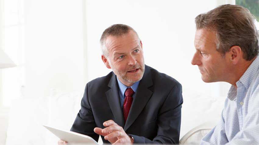 Two people collaborating while seated