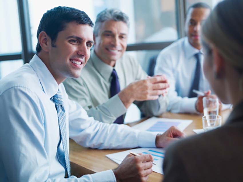Men in business suits having a meeting