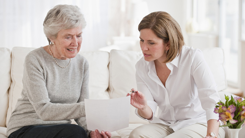 Two people reviewing retirement income emergencies