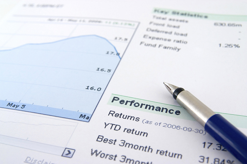 A piece of printed paper with a graph and year-to-date numbers