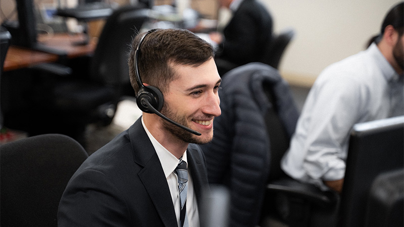 businessman doing business wearing a headset 