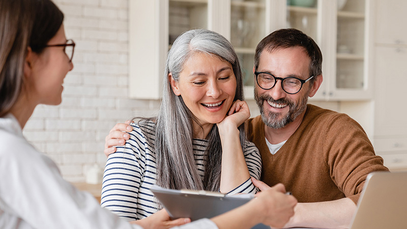 couple reviewing investment advice that is tailored to their individual needs